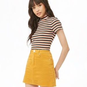 mustard yellow corduroy skirt 🐯
